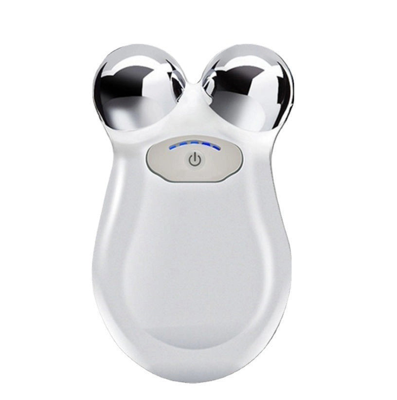 A white, handheld MICROCURRENT FACIAL TONING DEVICE by ETERUS features two metal spheres. Promoted benefits: wrinkle reduction, contour lifting, portability, and versatility. Design includes icons and green circles for a youthful look.