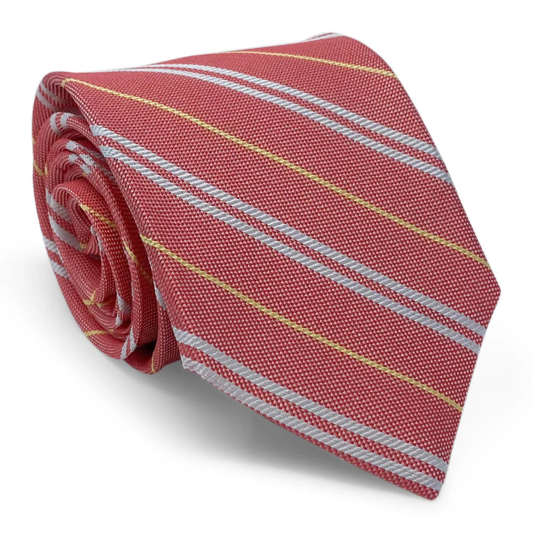 The PETER BLAIR - ANGUILLA TIE by BIRD DOG BAY is a red woven silk tie with light gray and thin yellow diagonal stripes, handmade in New York—an elegant choice for gifting or pairing with a gift box.