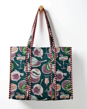 Discover a repeating pattern of caviar tins, open shells filled with caviar, mini forks, and champagne glasses set against a deep green background—an elegant design featured on the PRINTFRESH - CHAMPAGNE & CAVIAR TRAVELER TOTE by PRINTFRESH.