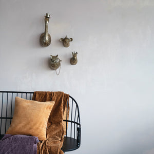 The CREATIVE COOP MOUSE HEAD WITH HAT WALL DÉCOR features an antique brass finish and is a whimsical mouse sculpture with large ears and a pointy hat, perfect as charming wall décor for your home.