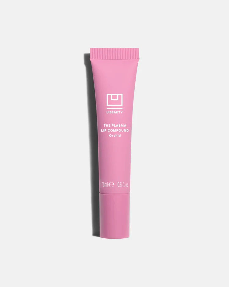 A pink tube of U BEAUTY - THE PLASMA LIP COMPOUND IN ORCHID stands upright on a light gray background, displaying the brand logo and product details in white text.