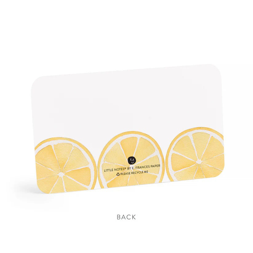 The E. FRANCES PAPER - LEMON LITTLE NOTES come in a clear box with 85 hand-painted watercolor lemon-illustrated cards. The label says, "E. Frances, Little Notes, use unsparingly." These notecards add citrus charm to any message with simple packaging featuring lemon graphics.