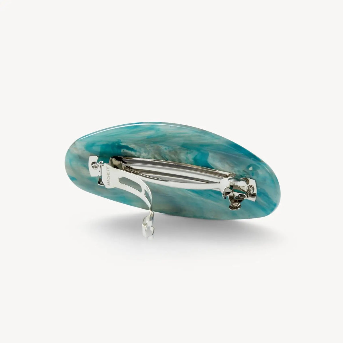The MACHETE Jumbo Oval Barrette in Jadeite, crafted from Italian acetate with a metal clasp, is featured against a plain white background.