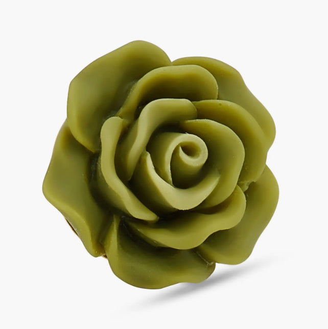 The CLIFTON WILSON RESIN LAPEL FLOWER PIN features vibrant orange and yellow petals in a rose-like design, closely resembling a wedding boutonniere, and is photographed against a plain white background.