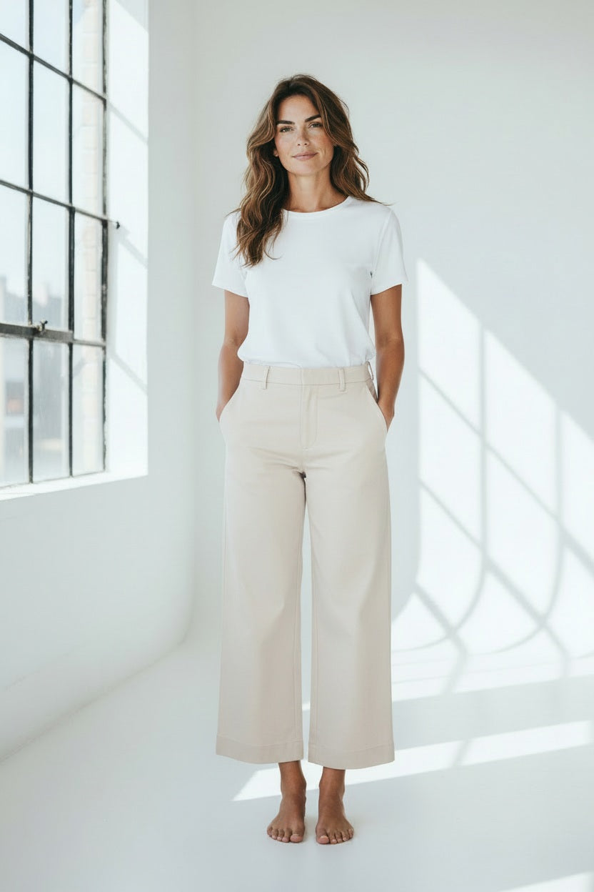 The FRANK &amp; EILEEN Westport Italian wide leg chino in Chalk is a white, mid-rise ankle pant with belt loops and side pockets, crafted from performance twill and shown flat on a white background.