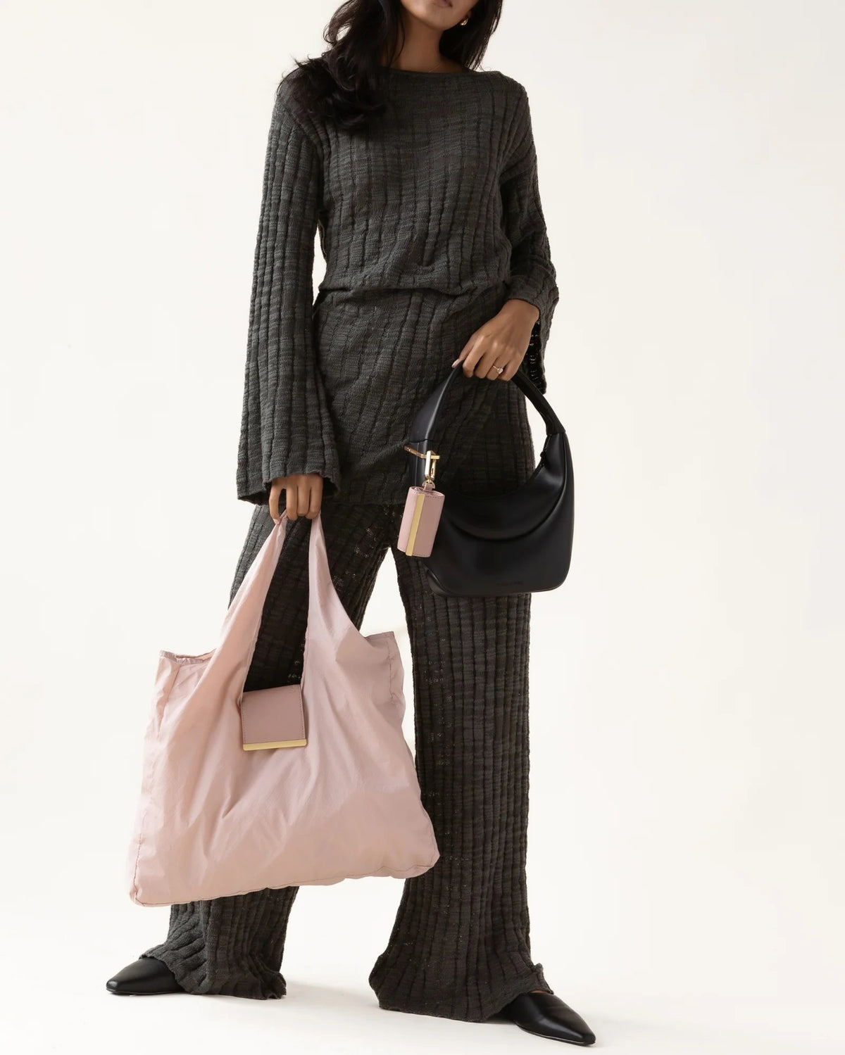 The KEOTE Keychain Tote in Blush is a light pink compact tote bag paired with a matching rectangular pouch, displayed together and separately against a white background.