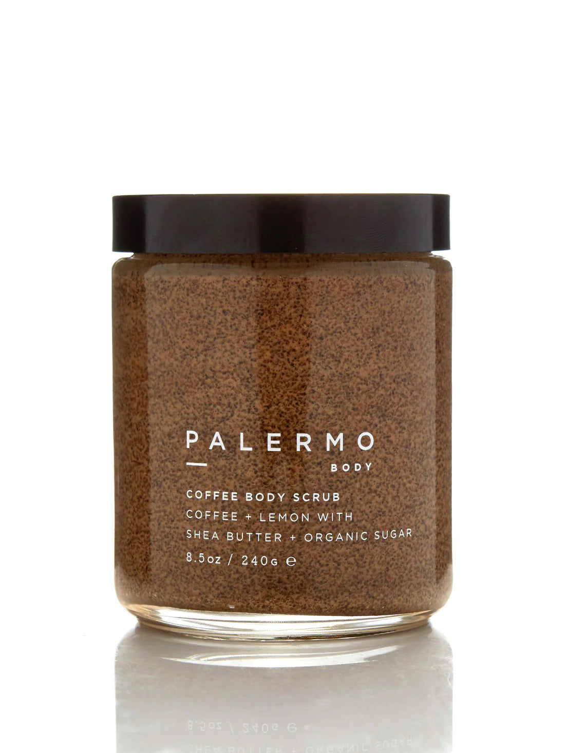 A jar of PALERMO BODY - COFFEE &amp; LEMON BODY SCRUB is shown against a white background. The organic coffee scrub, featuring lemon, shea butter, moisturizing coconut oil, and organic sugar, comes with a black lid. The label details the product information and the quantity is 8.5 oz / 240 g.