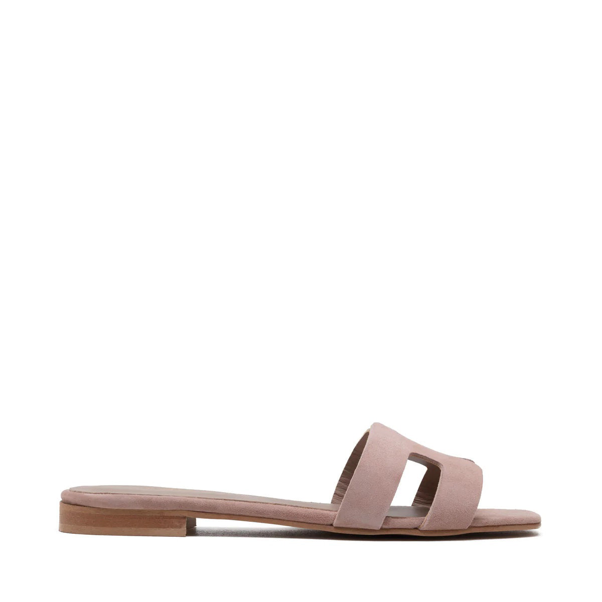 The image depicts the MICHELE LOPRIORE - H SLIDE, a single brown leather slide sandal with an open-toe design. The upper features two wide straps with geometric cutouts. The thin sole appears to be made of light brown wood-like material. Made in Italy by MICHELE LOPRIORE, the sandal is displayed against a plain white background.
