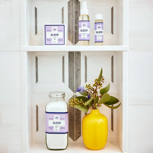 BAUDELAIRE's Sleep Shower Mist features a calming purple and white design. This natural, phthalate-free aromatherapy spray is infused with lavender essential oils, and its convenient 2 oz size brings tranquility on the go.