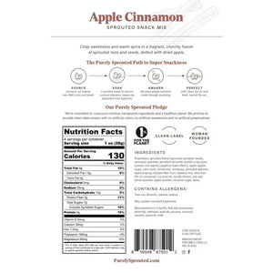 The image showcases a package of "PURELY SPROUTED - APPLE CINNAMON SPROUTED SNACK MIX" by PURELY SPROUTED. The front of the packaging emphasizes that this nutrient-dense snack is plant-based, gluten-free, a superfood, and vegan. Decorative images of the snack mix components such as almonds, cashews, pumpkin seeds, walnuts, and granola clusters are scattered around.