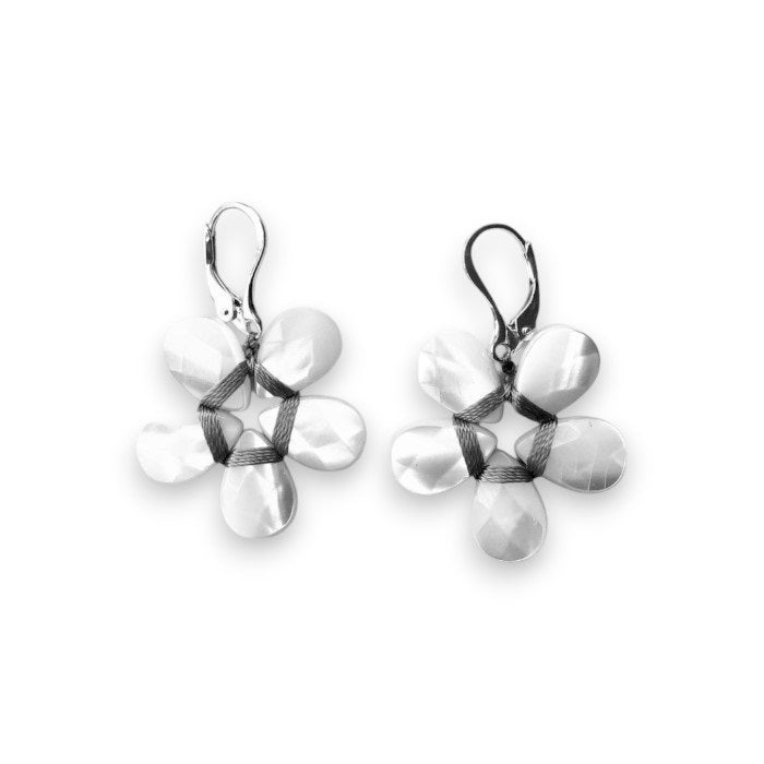 The ANN LIGHTFOOT - MOTHER OF PEARL FLOWER EARRING by ANN LIGHTFOOT features lever-back hooks and a five-petal flower design with a textured, sterling silver surface.