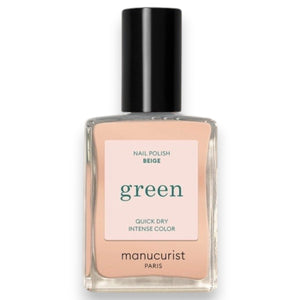 A hand with neatly manicured nails—polished in Beige with MANUCURIST - GREEN™ NAIL POLISH by MANUCURIST INC—rests gently on a textured, cream-colored, ruffled sweater.