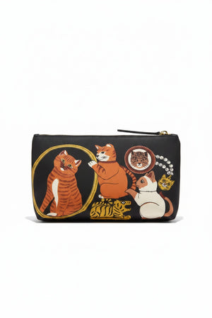 The INOUI EDITIONS - COLLECTIONNEUR CAT COSMETIC BAG by INOUI is a black clutch adorned with illustrations of a maneki-neko cat, a jaguar mask, a small gold animal, and an ancient vase featuring two animal figures. Crafted from stylish polyester with bovin leather accents, this bag features a top zipper closure and a sleek decorative design.