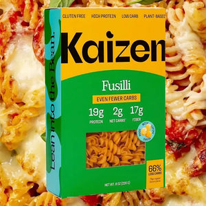 KAIZEN FOOD COMPANY's KAIZEN - FUSILLI features a blue and green box with a window showing the pasta. The plant-based, gluten-free, low-carb fusilli offers 19g protein, 2g net carbs, and 17g fiber per serving.