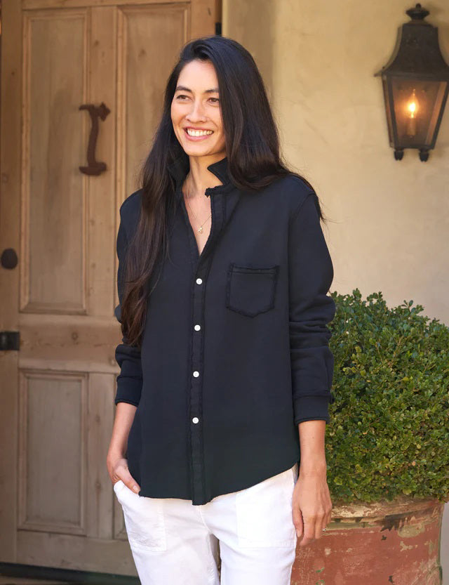 The FRANK &amp; EILEEN Eileen Relaxed Button Up in Triple Fleece British Royal Navy showcases bust-flattering button placement, long rolled-up sleeves, and a chest pocket. Set against a light textured background, it offers classic style and ultimate comfort.