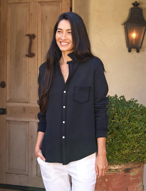 The FRANK & EILEEN Eileen Relaxed Button Up in Triple Fleece British Royal Navy showcases bust-flattering button placement, long rolled-up sleeves, and a chest pocket. Set against a light textured background, it offers classic style and ultimate comfort.