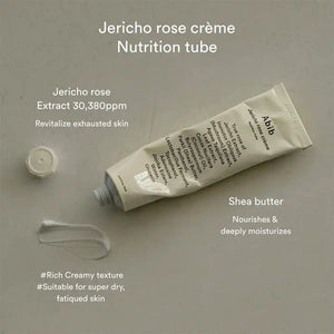 A white tube labeled "COLLAGEN EYE CREME JERICHO ROSE" by ASIAN BEAUTY WHOLESALE stands upright, its black text ingredient list featuring Jericho rose extract—highlighting this hydrating, vegan eye cream in a 30ml tube as a skincare essential.