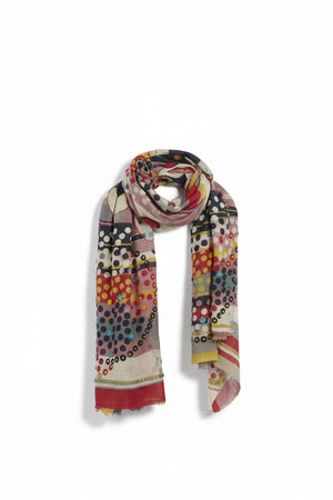 The STORIATIPIC - BAO wool scarf with embroidery in rouge features a vibrant pattern of abstract dots and geometric shapes in red, yellow, black, and beige. Crafted from embroidered wool and measuring 100 x 200 cm, this colorful accessory is neatly folded and draped against a white background.