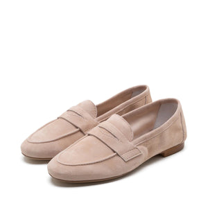 A side view showcases the MICHELE LOPRIORE - PAOLA SUEDE LOAFER in beige against a white background. This mocassin-style loafer, crafted from genuine leather, features a smooth texture with a simple design and low heel.