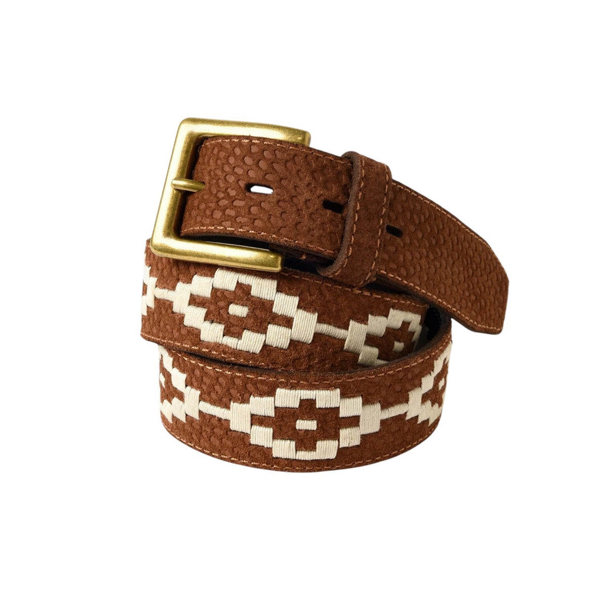 The LA MATERA - EL CAMPO POLO BELT by LA MATERA features brown saddle leather, a gold buckle, textured surface, and white hand-embroidered geometric patterns, coiled neatly against a white background.