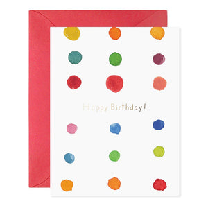 The E. FRANCES PAPER - BIRTHDAY DOTS GREETING CARD features colorful dots on a white background with "Happy Birthday!" in playful gold foil accents. A red envelope peeks out, enhancing its cheerful charm.