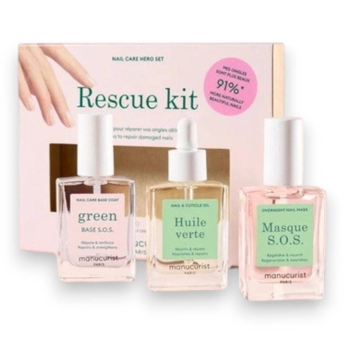 The MANUCURIST - RESCUE KIT by MANUCURIST INC is a manicure rescue set featuring three nail care essentials: Green Base S.O.S., Huile Verte, and Masque S.O.S. Presented in pastel green and pink packaging, this kit is designed to repair damaged nails in just two weeks.
