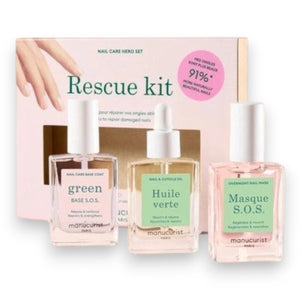 The MANUCURIST - RESCUE KIT by MANUCURIST INC is a manicure rescue set featuring three nail care essentials: Green Base S.O.S., Huile Verte, and Masque S.O.S. Presented in pastel green and pink packaging, this kit is designed to repair damaged nails in just two weeks.