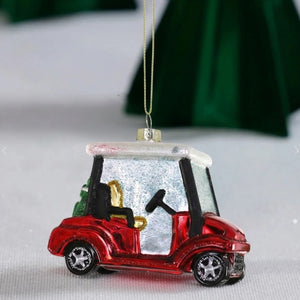 A glittery, 3.75-inch red and white GLASS GOLF CART ORNAMENT by CODY FOSTER.