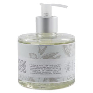 A pump bottle of HERITAGE LIQUID SOAP - HONEY ALMOND by EUROPEAN SOAPS, LLC. Infused with shea butter and glycerin, the label features illustrations of flowers and almonds, with text in English and French. The bottle contains 11.8 fluid ounces (350 milliliters) of liquid soap.