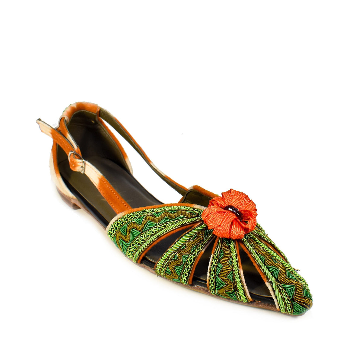 The MEHER KAKALIA - QUEEN DORIS SLING BACK in HAWAIIAN SANDS NILE showcases vibrant green and orange woven patterns with a traditional embroidery style, decorative toe knot, adjustable ankle strap, closed heel, and branded insole.