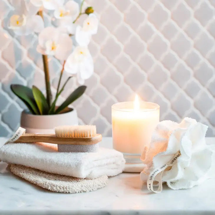 Introducing the CELLULITE BRUSH by EUROPEAN SOAPS, LLC: a long-handled wooden bath brush with natural bristles, ideal for personal care and spa routines. The handle features a small strap at the end for easy hanging. The dense bristle side is perfect for exfoliating and scrubbing, making this brush a standout in natural bath products.