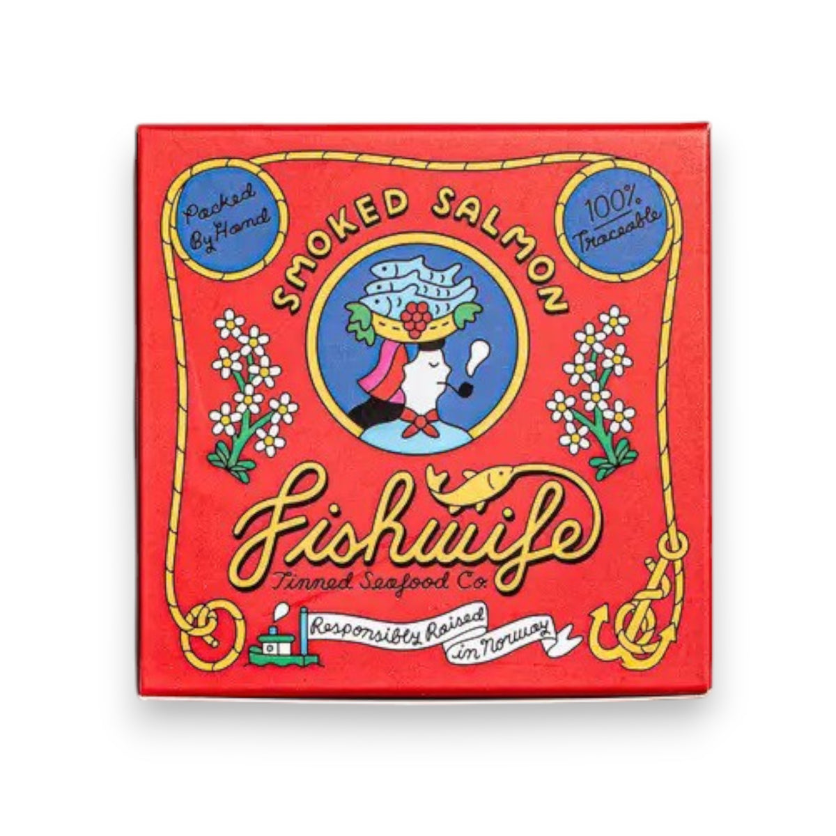 A red square box of FISHWIFE - SMOKED ATLANTIC SALMON is shown. The front showcases vibrant illustrations, including a woman holding a fish on a plate, decorative text, and labels such as "100% Traceable," "Responsibly Raised in America," emphasizing its origins from a family-run cannery that uses sustainable seafood.