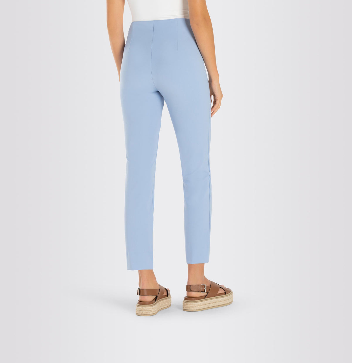 Introducing the MAC - ANNA PULL ON PANT by MAC, a pair of beige dress pants with a tailored fit featuring seam detailing along the front. Made from easy-care material, these slim-fit pants have a straight-leg cut and are showcased laid flat on a white background.