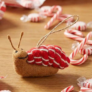 CANDY CANE SNAIL ORNAMENT by FELT SO GOOD, a felted snail with a red and white candy cane-patterned shell and a string loop for hanging.