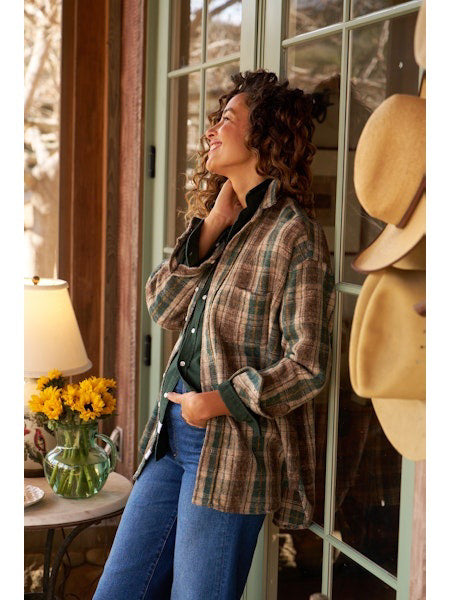 The FRANK &amp; EILEEN EILEEN Relaxed Button Up Shirt in heavier weight Italian flannel features a plaid pattern in brown, beige, and green, long sleeves (one rolled up), buttery-soft cotton, and an inside label reading "Frank &amp; Eileen EST. 1947".