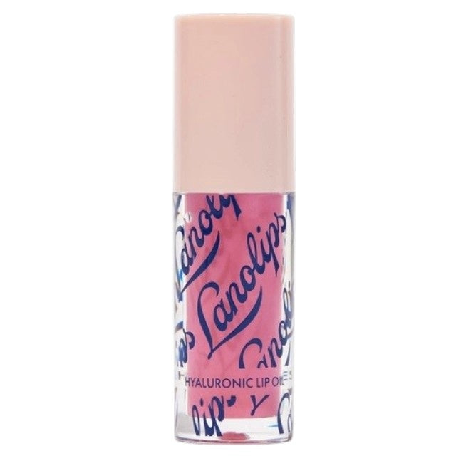 A woman with glossy pink lips holds a tube of LANOLIPS Hyaluronic Lip Oil in Raspberry near her face, looking upward with a slight smile, showcasing the non-sticky lip oil’s effortless lip hydration.