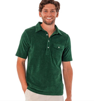 Close-up of the CRIQUET - Terrycloth Players Shirt in Alligator Alley, showing its green textured fabric, white buttons, chest pocket, and part of the classic fit collar.