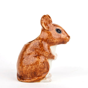 The QUAIL CERAMICS - WOOD MOUSE BUD VASE by QUAIL DESIGNS is a hand-painted stoneware figurine shaped like a brown mouse with white accents, sitting upright and looking to the right, shown on a plain white background.
