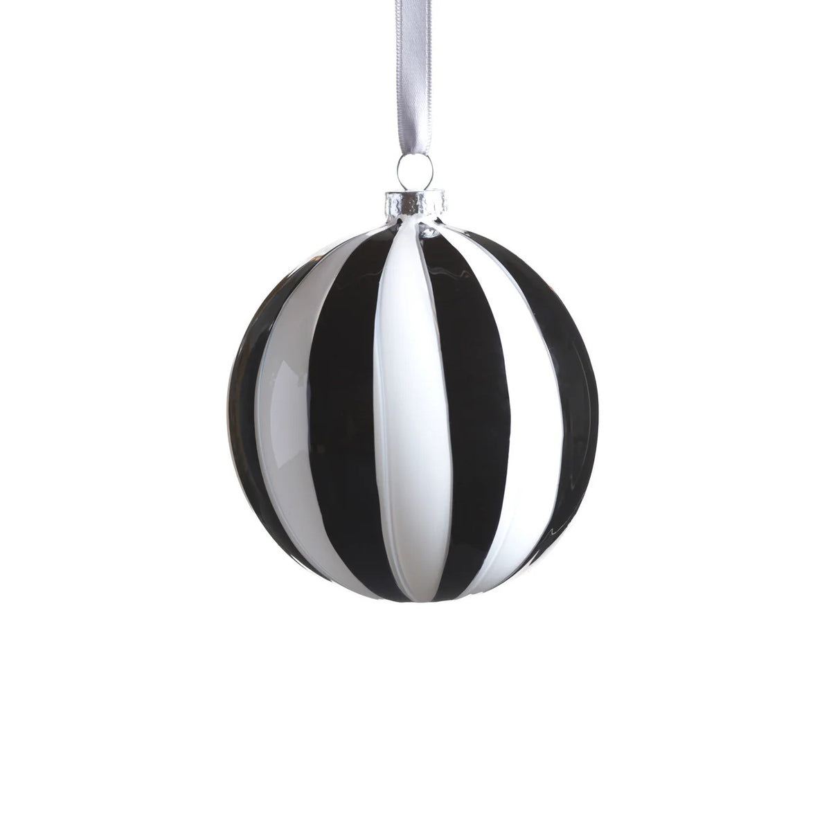 The ZODAX TWILIGHT STRIPE BALL ORNAMENT 4&quot; is a round glass ornament with alternating black and white vertical stripes, hanging from a silver ribbon, shown against a white background.