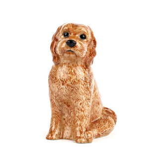 The QUAIL DESIGNS QUAIL CERAMICS Cockapoo Dog Flower Vase features a hand-painted brown, curly-haired dog with black eyes and nose, sitting upright against a plain white background.