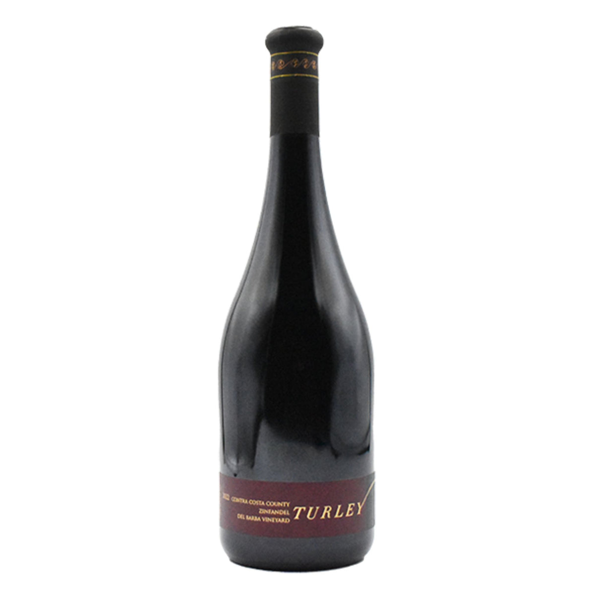 A dark glass wine bottle with a long neck and a black capsule on top features a black and maroon label reading “TURLEY.” Crafted by WINE: ADVINTAGE, this distinctive bottle contains their TURLEY ‘DEL BARBA’ ZINFANDEL 2023, renowned for its rich character and celebrated old vine heritage.