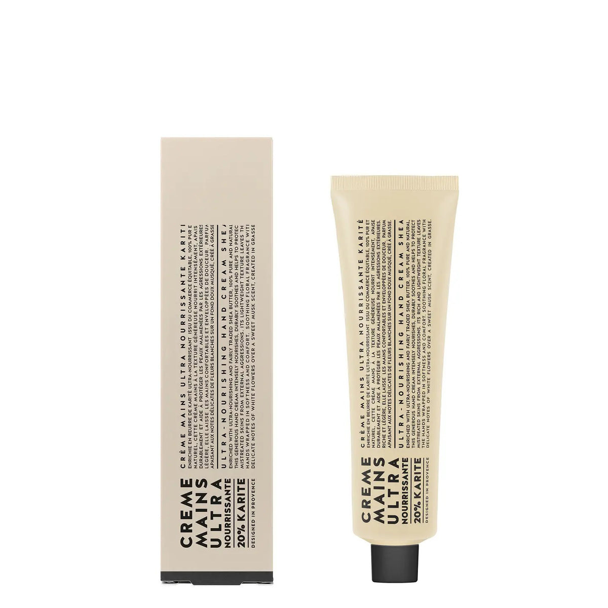 A beige tube of CIE LUXE BRANDS COMPAGNIE DE PROVENCE Hand Cream Shea Butter 3.4oz, with black text, stands beside its matching box on a white background—highlighting this nourishing shea butter hand cream.