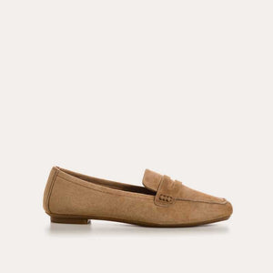Top view of the REQINS - HEMA suede loafer in natural, featuring stitching details and a subtle branded leather insole, highlighting REQINS' craftsmanship against a plain white background.