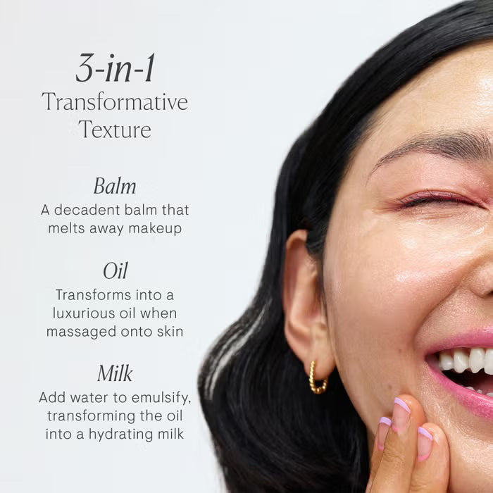 A jar of ELEMIS - PRO-COLLAGEN GREEN FIG CLEANSING BALM by ELEMIS - STEINER is depicted with its lid removed, exposing the yellow balm within. The text on the green jar states &quot;Hydrating cleansing balm.&quot; Centered on a white background, this jar highlights nourishing plant oils designed to deeply cleanse your skin.