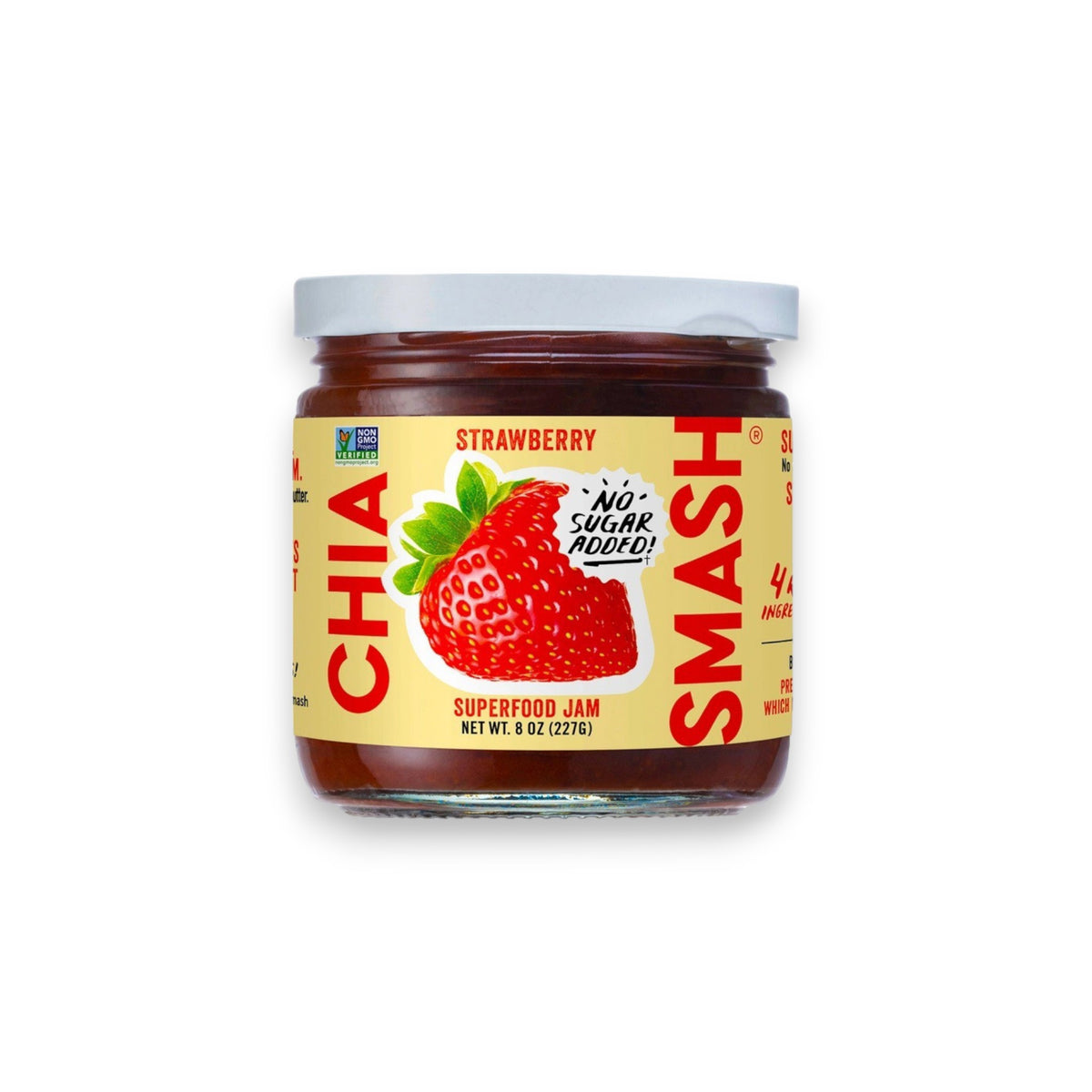 A jar of CHIA SMASH - STRAWBERRY CHIA JAM with zero added sugar. The jar boasts a red lid and a label showcasing a large strawberry illustration, along with the text "No Sugar Added!" and "Non-GMO Project Verified" certification. Made from upcycled fruit, this 8 oz (227g) jam is both paleo and vegan friendly.