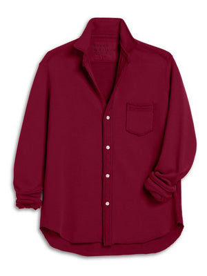 The FRANK & EILEEN EILEEN Sweatshirt Button Up in Garnet is a relaxed-fit, long-sleeve maroon shirt with a collar, single chest pocket, and partially rolled sleeves, garment-dyed and shown on a plain white background.
