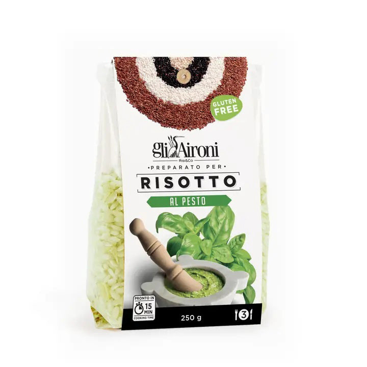 A 250g pack of GLI AIRONI - PESTO RISOTTO by ZIA PIA IMPORTS, made with premium carnaroli rice, shows green pesto in a mortar with basil and rice on the gluten free packaging. Ready in 15 minutes.
