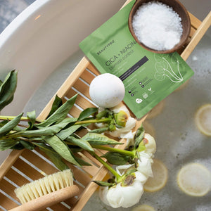 The BEAUTYPRO - CICA + NIACINAMIDE BLEMISH CONTROL MASK, presented in green packaging under the trusted BEAUTY PRO brand, promises to minimize pores, brighten skin, and provide anti-aging benefits. It features a biodegradable mask and packaging made with natural plant ingredients and is paraben-free.