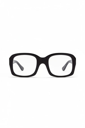 CADDIS - SHELBY PROGRESSIVE READERS by CADDIS are black, square, thick-rimmed eyeglasses with oversized frames and clear, scratch-resistant lenses. Shown front-facing on white; "Shelby" printed in white inside the left arm.