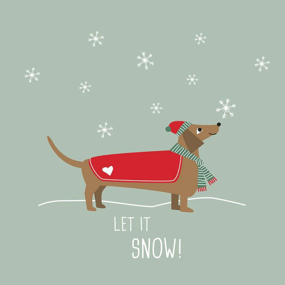 PAPER PRODUCTS DESIGN&#39;s WINTER STORY BEVERAGE NAPKINS feature a brown dog in a red coat, green-striped scarf, and red hat in snowy scenery with &quot;LET IT SNOW!&quot; text on pale green—printed on naturally bleached napkins.